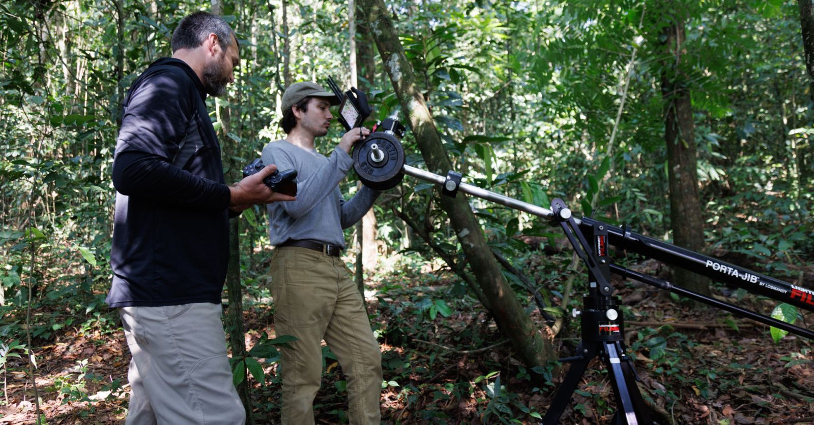 Cinematographers Henry Davis and Skip Hobbie filming poison dart frogs in Costa Rica as a part of the Gladiators series